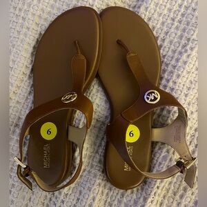 Never worn Michael Kors sandals size 9